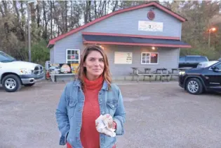  ?? REX MILLER ?? Vivian Howard stands outside Helen’s Bar BQ in Brownsvill­e for the barbecue episode of “Somewhere South.”