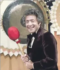  ?? Ron Tom NBC via Getty Images ?? DOMINATED THE TV GAME SHOW LANDSCAPE Chuck Barris, host of “The Gong Show,” veered between funny and obnoxious. But his shows became must-watch programmin­g.