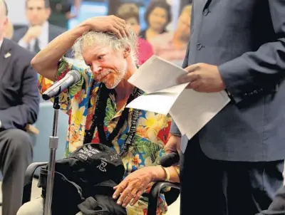  ?? CARLINE JEAN/SUN SENTINEL ?? Thomas Righetti, who is homeless, appears before Broward Judge Jack Tuter and Judge Florence Taylor Barner for Fort Lauderdale’s first homeless community court Wednesday at City Hall in Fort Lauderdale.