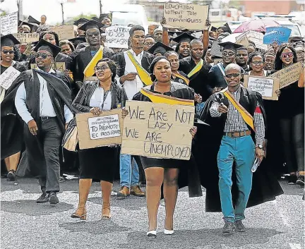  ?? / SIBONGILE NGALWA ?? Hundreds of Eastern Cape graduates marched to the premier’s office to demand jobs in March. Statistics show that race dynamics come into play for graduates to secure employment.