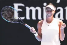  ?? Darrian Traynor / Getty Images ?? Madison Keys of the United States, the tournament’s 17th seed, celebrates a fourth-round win over No. 8 Caroline Garcia.