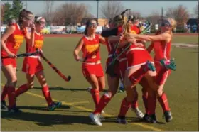  ?? SARAH PIETROWSKI — FOR DIGITAL FIRST MEDIA ?? Members of the Moravian Academy field hockey team cekebrate after winning the PIAA Class A title at Whitehall last Saturday, Nov. 19 against Oley Valley.