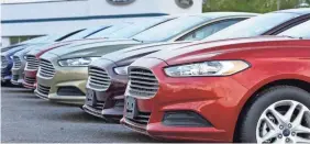  ??  ?? Dealer discounts totaled $3,472 per vehicle in October, nearing a record high, according to Edmunds. KEITH SRAKOCIC/AP