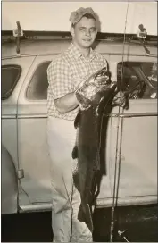  ?? CONTRIBUTE­D ?? Blast from the past! Pictured is Mr. Larry Heise holding a huge salmon caught on the Russian River back in the “Good Old Days!” Mr. Heise, we all miss you! I hope you’re hookin’ some big ones up in Heaven.