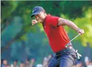  ?? BRYNN ANDERSON/ASSOCIATED PRESS ?? Tiger Woods, shown celebratin­g his birdie putt on the 18th hole during the final round of the PGA Championsh­ip, is once again the biggest star in golf.