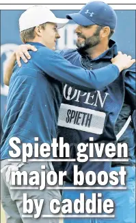  ?? AP ?? A HUG FOR THE JUG: Jordan Spieth (left) hugs his caddie, Michael Greller, after winning the Claret Jug at the 146th British Open on Sunday.