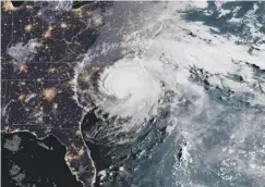  ??  ?? Florence makes landfall in the Carolinas yesterday