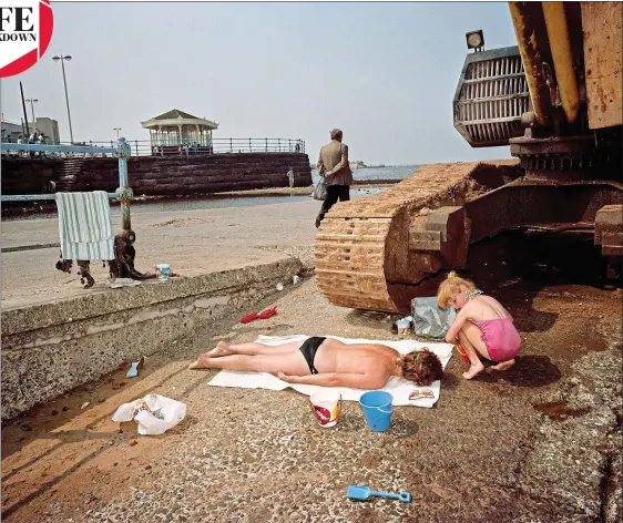  ??  ?? Seaside spirit: New Brighton beach, from the Last Resort 1983-85. With the entries to our competitio­n, Parr is looking for “the personalit­y of the photograph­er in the image”