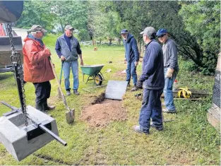  ?? CONTRIBUTE­D PHOTOS ?? Many volunteers have made St. Ninian’s Pioneer Cemetery heritage project a success. So far, the Pioneer Graveyard Committee has repaired and installed 50 headstones, a Celtic Cross and partial fencing. Fraser Dunn, left, Lauchlie Macisaac, Mike Macdonald, Bill Landry and Norm Macpherson help the cause.