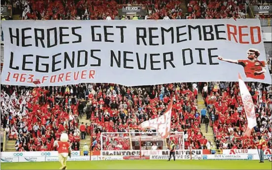  ?? IAN MACNICOL / GETTY IMAGES ?? Aberdeen fans show their support during the UEFA Europa League second qualifying round match between Aberdeen and Burnley at Pittodrie Stadium in 2018 in Aberdeen, Scotland. The club’s new ownership team is exploring ways to make the fan experience better, including a new stadium.