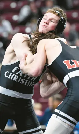  ?? RICK KINTZEL/THE MORNING CALL ?? Faith Christian’s Cael Weidemoyer wrestles Lackawanna Trail’s Max Bluhm at 152 pounds for third place during the 2A championsh­ips last season at the Giant Center in Hershey. He will get another shot at a state title after winning regionals Saturday.