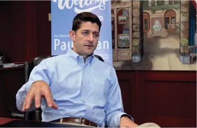  ?? MICHAEL SEARS / MILWAUKEE JOURNAL SENTINEL ?? House Speaker Paul Ryan talks with the Journal Sentinel about President Donald Trump’s plan to cut legal immigratio­n after the employee session at Inpro Corp. in Muskego. He also toured the facility. See more photos at jsonline.com/news.