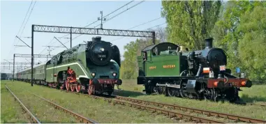  ?? DANNY HOPKINS/SR ?? Bill Parker’s ‘Small Prairie’ No. 5521 waits for the world’s fastest active steam locomotive, No. 18.201, to overtake it at Babimost, Poland, with its train from Germany to the Wolsztyn Parade on April 28 2007.