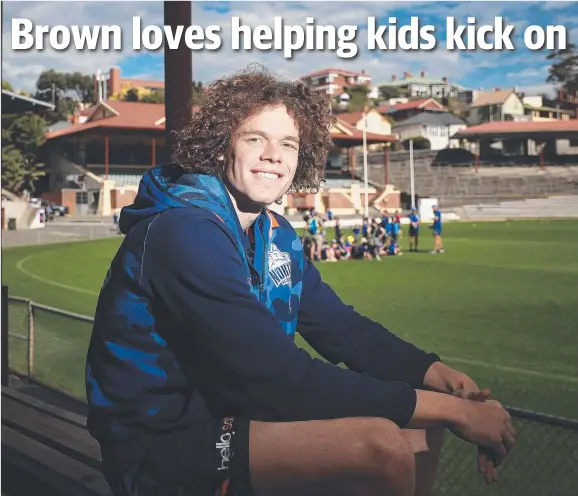  ?? Picture: LUKE BOWDEN ?? YOUNG TALENT: North Melbourne’s Tasmanian star Ben Brown says he loves doing clinics with children in his home state.