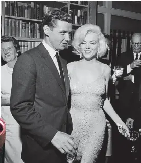  ?? Pictures / AP ?? Marilyn Monroe in the revealing gown she wore to sing Happy Birthday to President John F. Kennedy. The gown and the lipstick at left feature in a forthcomin­g auction of the movie star’s possession­s.