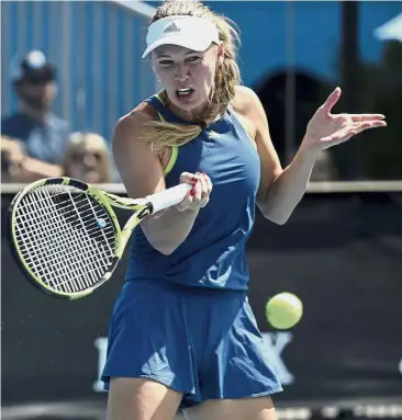  ?? — AP ?? Something new: Denmark’s Caroline Wozniacki is entering new territory as she will be defending a Grand Slam title for the first time in her career at the Australian Open which starts today.