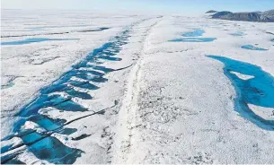  ?? THE CANADIAN PRESS FILE PHOTO ?? A rift in the Milne Ice Shelf on Ellesmere Island is shown in 2019. Canada’s last intact ice shelf is now 40 per cent smaller after a huge chunk started to break away late last month.
