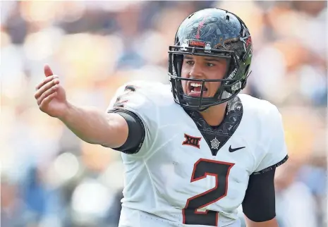  ?? CHARLES LECLAIRE, USA TODAY SPORTS ?? Oklahoma State’s Mason Rudolph has thrown 11 touchdown passes in the Cowboys’ three games.