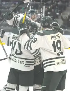  ??  ?? The Elmira Sugar Kings celebrate a goal on Sunday afternoon in their win against the Kitchener Dutchmen. The team won again on Tuesday night, tying up the series 2-2 in the GOJHL Midwestern Conference playoffs.