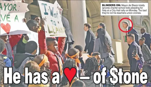  ??  ?? BLINDERS ON: Mayor de Blasio totally ignores charter-school kids pleading for help at a City Hall rally on Monday. Too bad they’re not his teachers-union cronies.