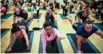  ??  ?? Employees of Bjoern Borg sportswear brand are pictured during a yoga class.