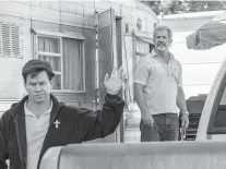  ?? KAREN BALLARD Sony Pictures/Columbia Pictures ?? Mark Wahlberg, left, and Mel Gibson in ‘Father Stu.’*