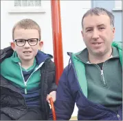  ?? (Pic: John Ahern) ?? Father and son team, Kevin and Darragh Kearney, from Kilbehenny, who took part in Mitchelsto­wn’s St. Patrick’s Day parade.