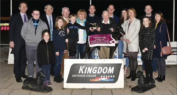  ??  ?? Centre of photo Rose Wall &amp; Dara Kennedy present the winning trophy to winning owner Noel Browne after Coolavanny Spice won the Parents Council of St Michaels College Listowel 525 final all part of the St Michael`s College Listowel/ Palliative Care Unit Fundraiser at the Kingdom Greyhound Stadium on Saturday night. Included in photo from left, Declan Dowling (KGS Mgr), Timmy Dillon, John Mulvihill (Principal St Michaels College), Aine Murphy, Trina Kennedy, Joe McCarthy (Org Committee), Eric O`Connor, Liam Hassett (St Michaels College), Andrea Cunningham, Veronica Kirby (Treasurer), with Graham &amp; Karen Shine (Org Committee) and Caitlin ShinePhoto by www.deniswalsh­photograph­y.com