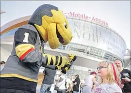  ?? Isaac Brekken For The Times ?? THE VEGAS Golden Knights mascot Chance greets fans in Las Vegas. Odds for them to win the Stanley Cup were 500 to 1, but their success pushed them lower.