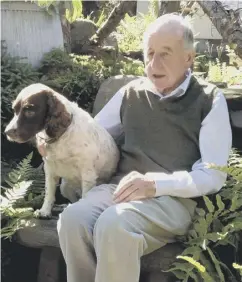  ?? ?? 0 Neill Mccormick relaxing with spaniel Lizzie