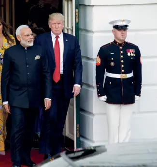  ??  ?? FAREWELL MR MODI The US president and the First Lady see off the Indian PM in June 2017