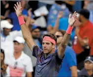  ?? AP PHOTO ADAM HUNGER ?? Juan Martin del Potro, of Argentina, celebrates after defeating Dominic Thiem, of Austria, during the fourth round of the U.S. Open tennis tournament, Monday in New York.