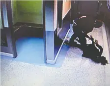  ?? COURT EXHIBIT ?? Calgary police officer, Const. Alexander Dunn, who body slammed female suspect Dalia Kafi face first to the floor while she was in custody, was convicted of assault causing bodily harm.
