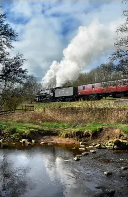  ?? (Ben Bucki) ?? Just after midday on April 2 5820 Big Jim heads up the valley near Damems with a staff training run.