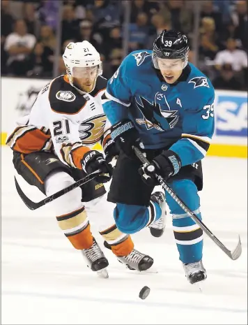  ?? PATRICK TEHAN — STAFF ?? Logan Couture, right, would be 32 in 2022 — likely past his prime if the NHL were to participat­e in the Beijing Games.
