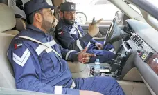  ?? Pawan Singh / The National ?? Mohammed Thabit Al Saadi and Mohammed Ahmed Al Saad, Dubai Police officers in their rescue vehicle