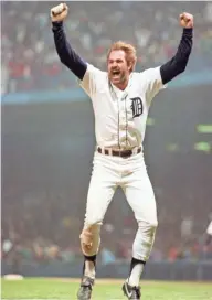  ??  ?? Kirk Gibson celebrates one of two home runs in Game 5 of the World Series against the San Diego Padres on Oct. 14, 1984, in Detroit. The Tigers won the series that night.