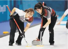  ?? Aaron Favila / Associated Press ?? South Korea’s unheralded “Garlic Girls” energized the host country with their inspiring run to a silver medal in curling.