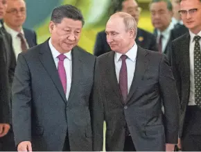  ?? ALEXANDER ZEMLIANICH­ENKO/AP POOL, FILE ?? China said Friday that President Xi will visit Russia from Monday to Wednesday in an apparent show of support for Russian President Vladimir Putin amid sharpening East-west tensions over the conflict in Ukraine.