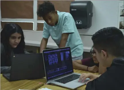  ?? JULIO MORALES PHOTO ?? Seventh grade Barbara Worth Junior High students work on their film projects on May 14 as part of their campus' participat­ion in the Latino Film Institute Youth Cinema Project. The students recently screened their completed projects in Los Angeles on...