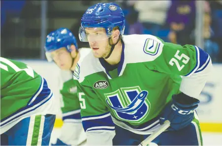  ??  ?? The Utica Comets, including Brogan Rafferty, may have difficulty getting players across the border next season to join their parent club, the Canucks.
