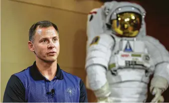  ?? Yi-Chin Lee / Houston Chronicle ?? NASA astronaut Nick Hague answers questions from University of Houston ROTC cadets during a news conference at Johnson Space Center on Monday in Houston.