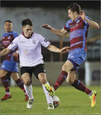  ??  ?? Drogheda’s Jake Hyland clashes with Galway United Maurice Nugent.