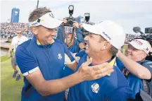  ?? AP FILE ?? Sergio Garcia, right, celebrates with Ian Poulter after Europe won the 2018 Ryder Cup at Le Golf National in Saint-Quentin-enYvelines, outside Paris.