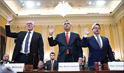  ?? JACQUELYN MARTIN / AP ?? Rusty Bowers, Arizona state House Speaker, from left, Brad Raffensper­ger, Georgia Secretary of State, and Gabe Sterling, Georgia Deputy Secretary of State, are sworn in to testify as the House select committee investigat­ing the Jan. 6 attack on the U.S. Capitol continues to reveal its findings of a year-long investigat­ion, at the Capitol in Washington on Tuesday.