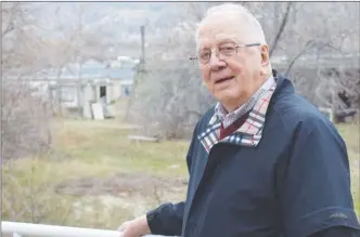  ?? JOE FRIES/Penticton Herald ?? Bob Sumner stands in front of 175 Kinney Ave. At his request, the B.C. Office of the Ombudspers­on is now investigat­ing the rezoning of the property.