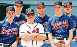  ?? AJC ?? Braves pitching coach Leo Mazzone is surrounded by his pitchers in that 1995 season (clockwise from left) Tom Glavine, Steve Avery, Kent Mercker, John Smoltz and Greg Maddux.