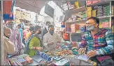  ?? HT FILE ?? People purchase firecracke­rs at Sadar Bazar in New Delhi.