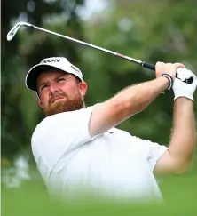  ?? ?? Flying start: Shane Lowry in action in Singapore
