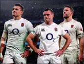  ??  ?? DEJECTED: England react to defeat